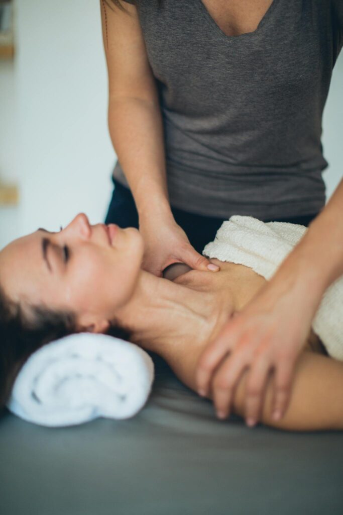 A Woman Lying on the Bed with Her Eyes Closed